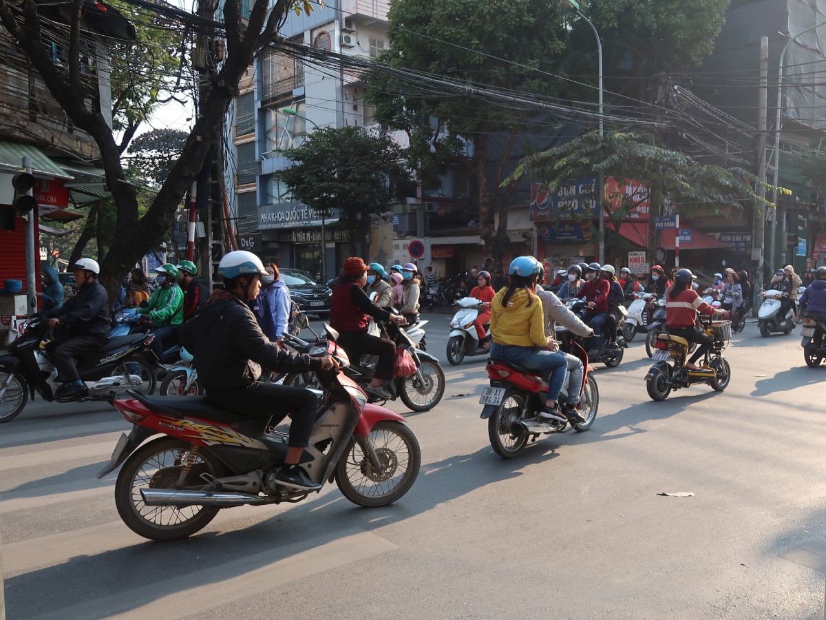 Hanoi traffic with a lot of scooters