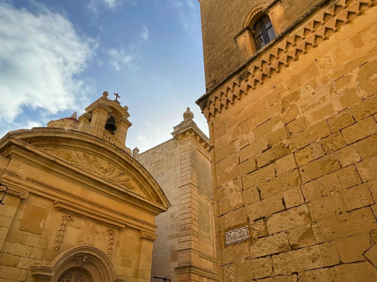 detailed view on church and historic building in Mdina St Peter Street