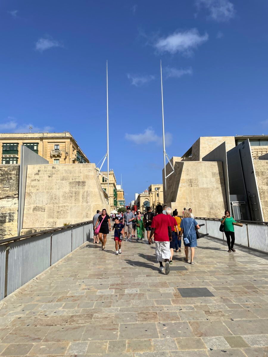 City Gate in Valletta with a lot of tourists during the hot day