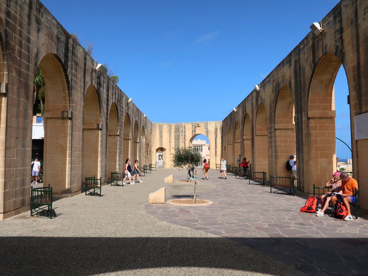 tourists exploring Lower Barrakka Gardens during summer days