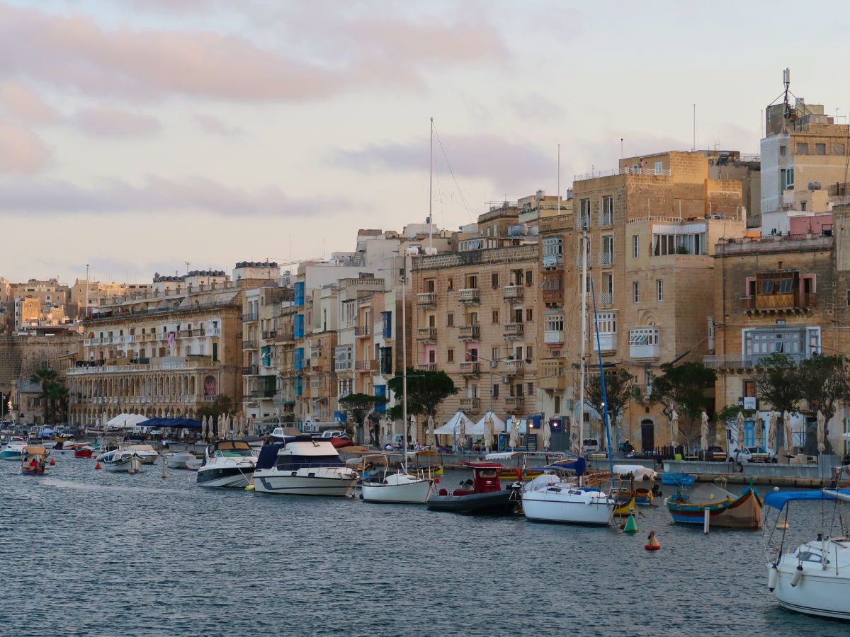 small boats parked in Senglea waterfront in Three Cities Malta