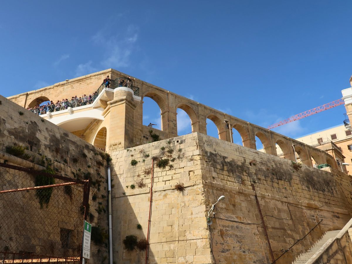 View on from the street under the Upper Barrakka Gardens with tourists