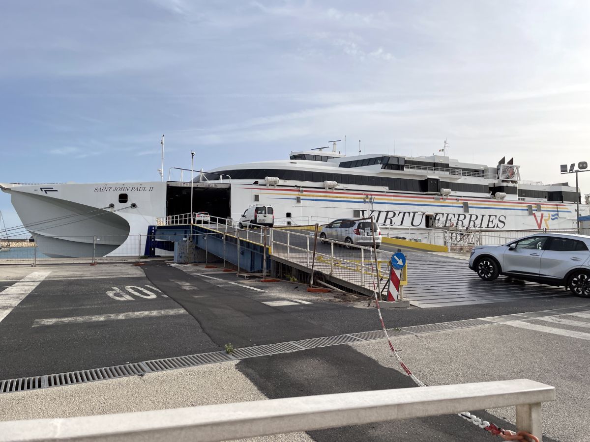 cars are loading to Virtu Ferries ferry at the ferry port in Pozzallo