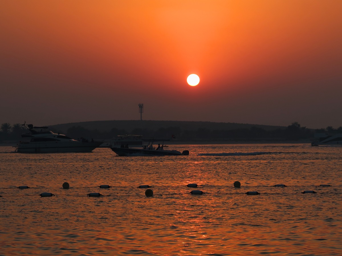 sunset on the abu dhabi beach